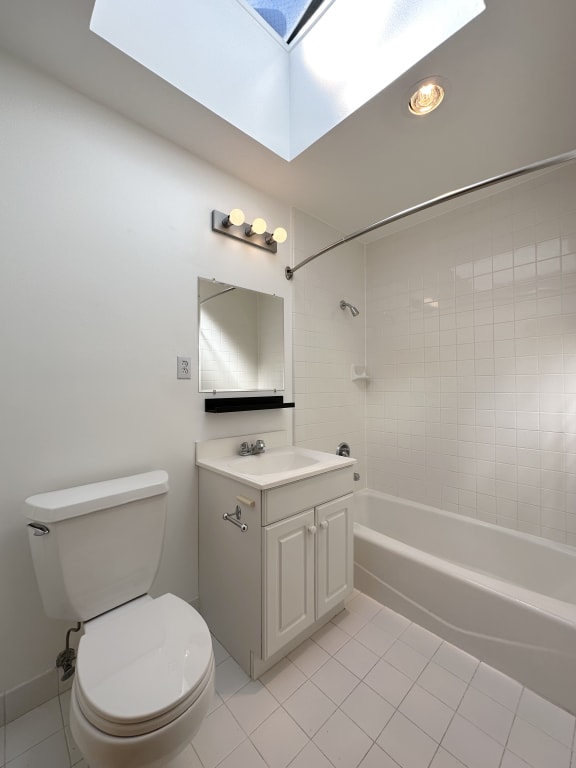 a bathroom with a toilet sink and bathtub
