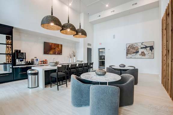 clubhouse and resident social lounge with full kitchen at Tapestry Nona Apartments in Orlando, FL