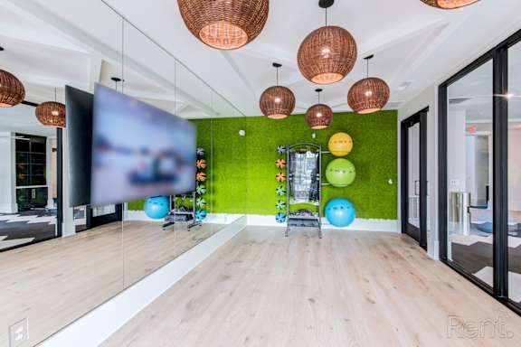 yoga room at Tapestry Nona Apartments in Orlando, FL