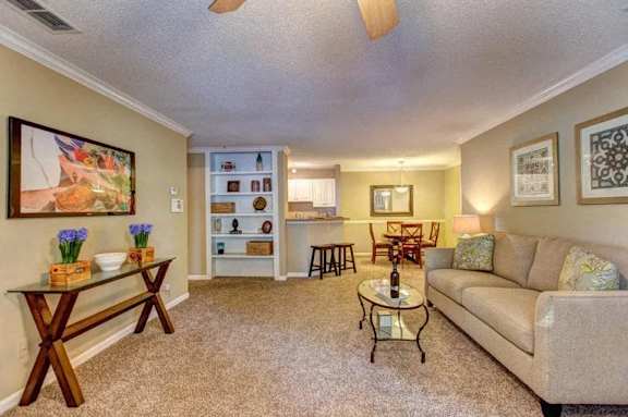 a living room with a couch and a table