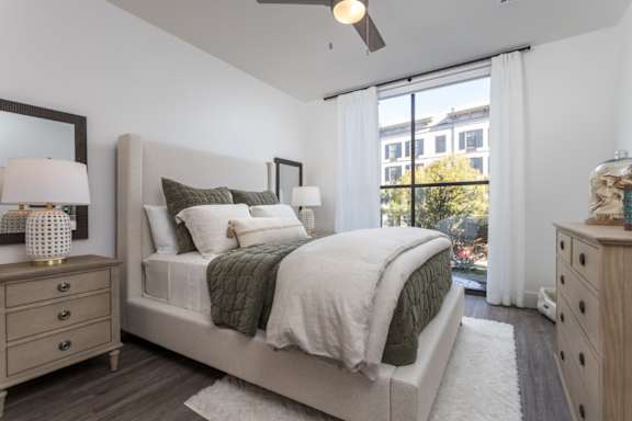 The primary bedroom with oversized windows at 2020 Providence in Huntsville, AL