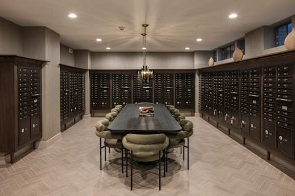 Package room with large conference table at 2020 Providence in Huntsville, AL