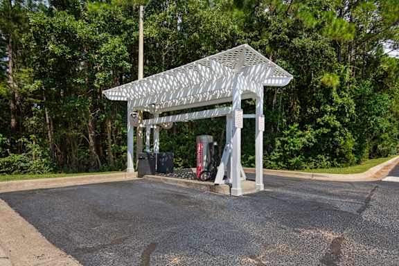 Covered car care center with a car vacuum at Crystal Lake in Pensacola, Florida.