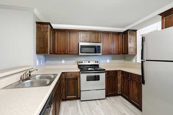 stainless steel kitchen appliances at The Oakley at Deerfield Apartments in Florence, AL