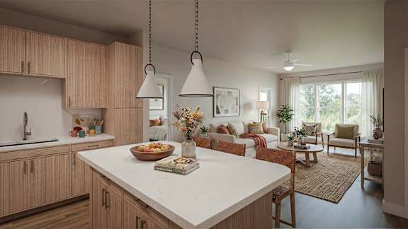 A kitchen with wooden cabinets and a white island with a book on it.