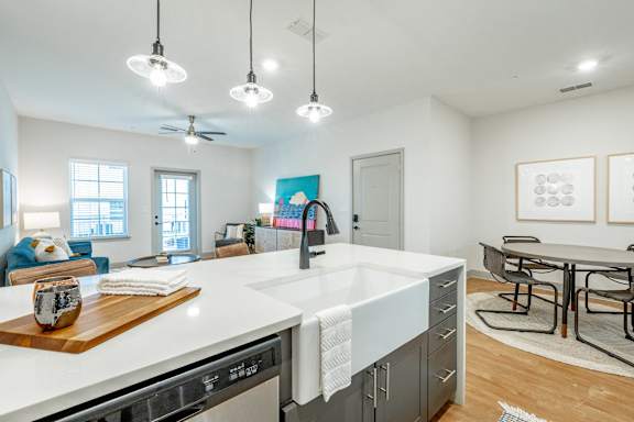common area with a ceiling fan at Anthem Luxury Rentals  and Apartments in Huntsville, AL