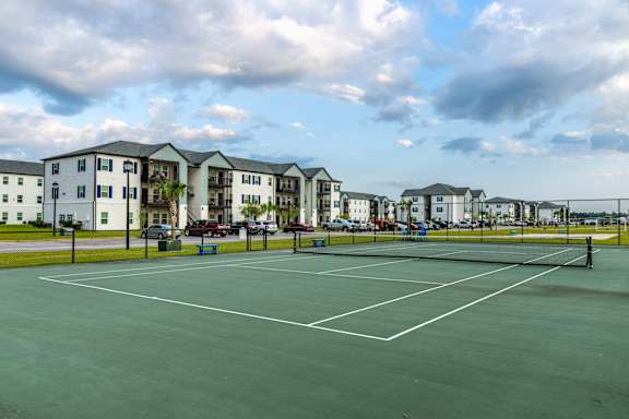 a tennis court at The Reserve of Foley Apartments in Foley, AL