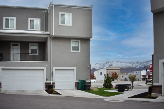 Grey building exterior at The Village at Church & Main, Layton