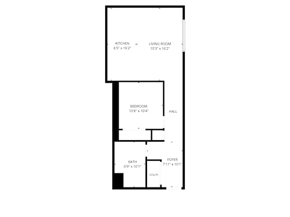 A floor plan of a house with a kitchen, living room, bedroom, bath, and foyer.
