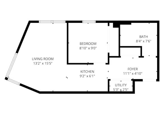 A floor plan of a house with a living room, kitchen, bedroom, bathroom and utility space.