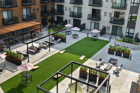 an aerial view of the courtyard of an apartment building