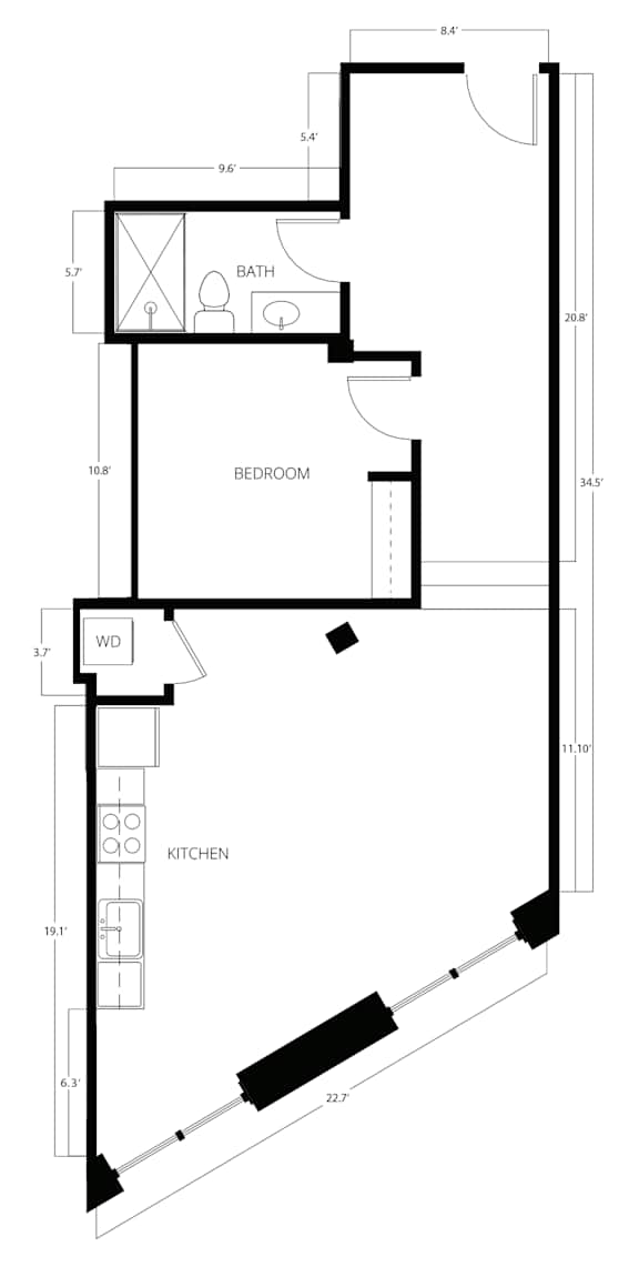A floor plan of a house with a bedroom, bathroom, and kitchen.