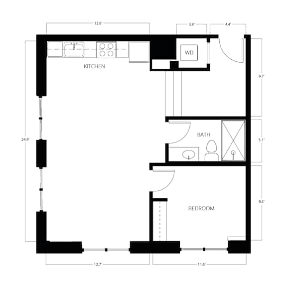 A black and white floor plan of a small apartment with a kitchen, bathroom, and bedroom.