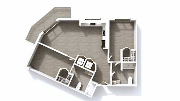 A white architectural model of a house with a kitchen and living room.