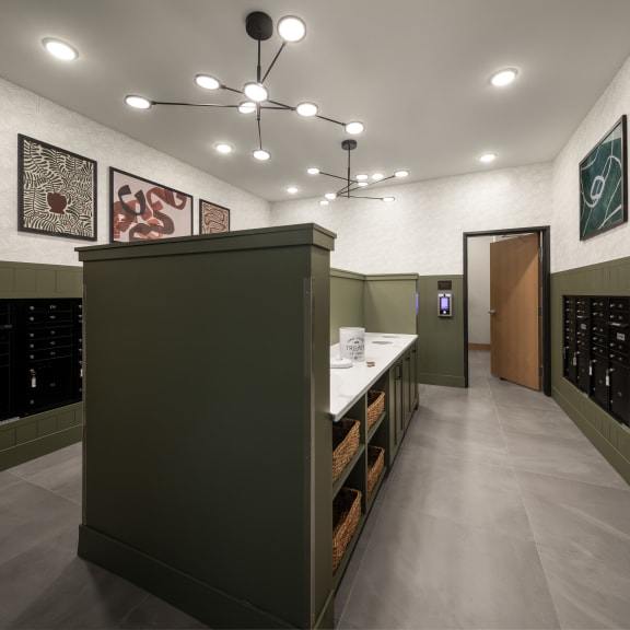 a tasting room with a counter and a door to a wine cellar