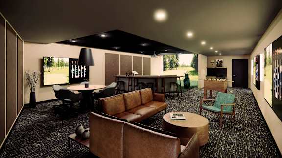 A living room with a brown couch and a black and white rug.
