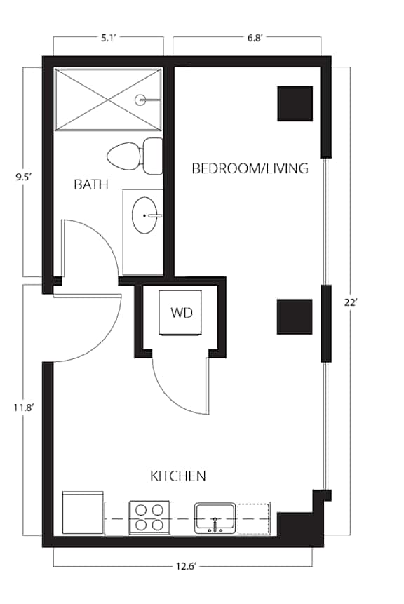 A floor plan of a small apartment with a bedroom, a kitchen, and a bathroom.