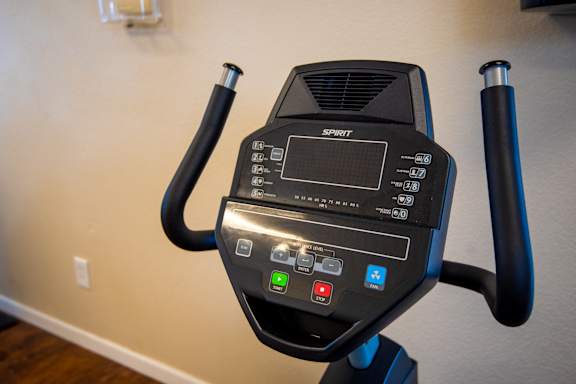 A black exercise bike with the word "SPORT" on the front.