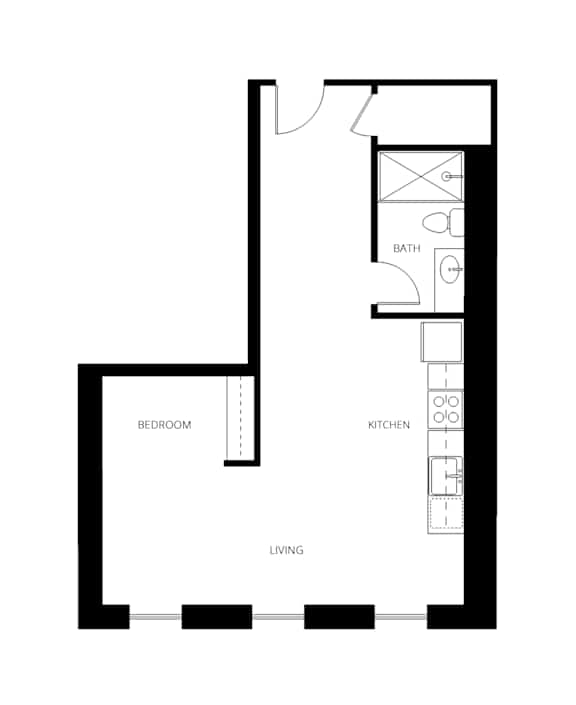 A floor plan of a small apartment with a bedroom, living room and kitchen.
