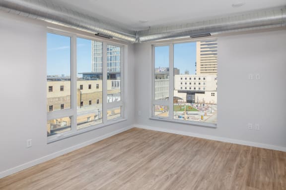 Large windows with view of cityscape at Kesler Apartments in Downtown Fargo, Fargo, North Dakota 58102
