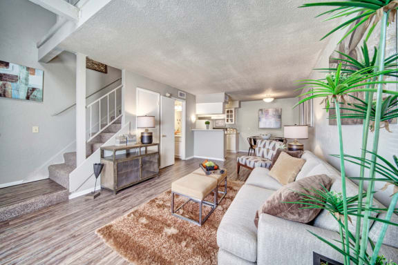 a living room with a couch and a chair