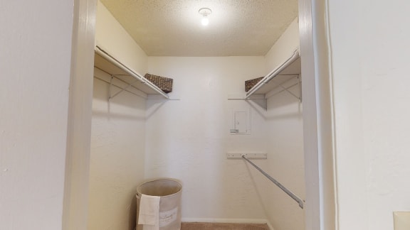 a walk in closet in a 555 waverly unit