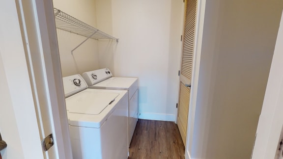 Penthouse Laundry room with washer and dryer