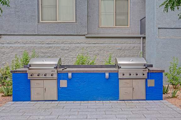 two bbq grills at the district flats apartments in lenexa, ks