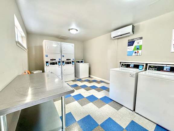 A laundry room with a washer and dryer.