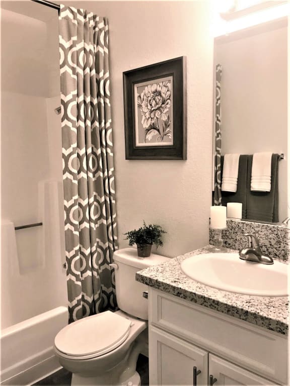 Bathroom with vanity at Bella Park Apartments, Rialto CA, 92376