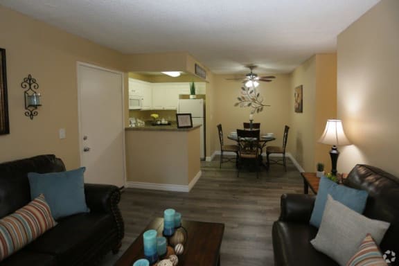 Living Room With Kitchen View at Citrus Gardens Apartments, Fontana, 92335