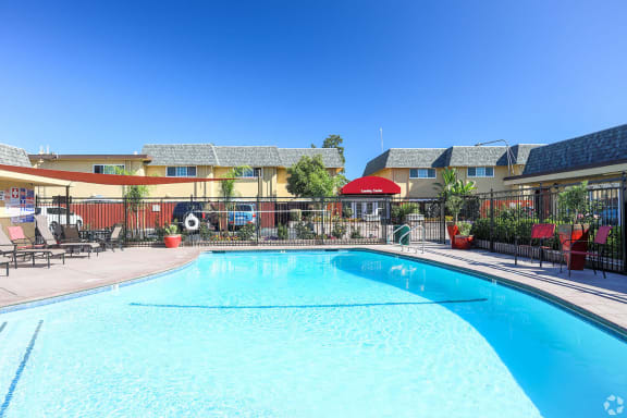Pool With Sunning Deck at Dover Park Apartments, California, 94533