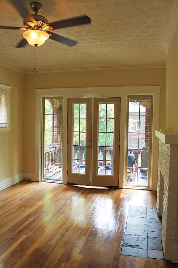 Living room doors and a ceiling fan at Westwood Meadows, Westlake, OH, 44145