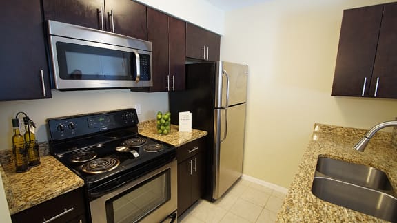 Kitchen with stainless steel appliances and granite counter tops