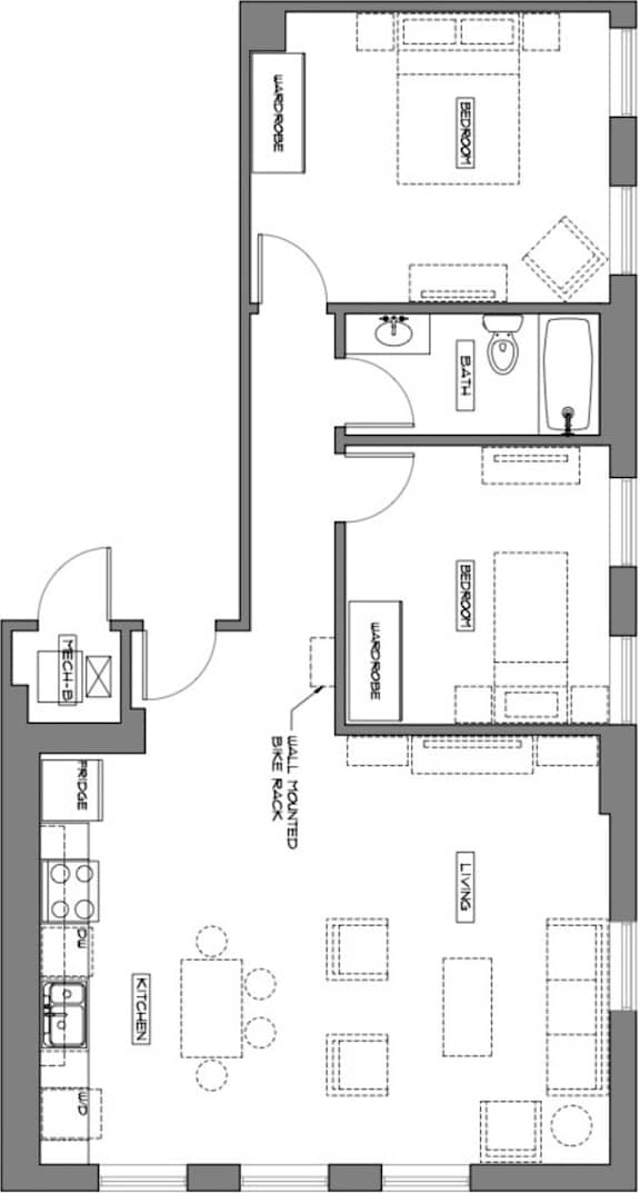 A floor plan of a house with a kitchen, living room, and bathrooms.