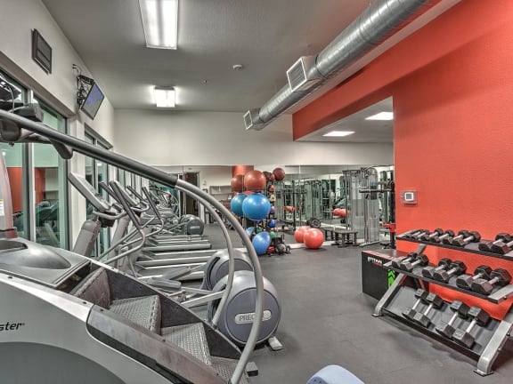 the gym at the flats at big tex apartments at The Mosaic on Broadway, Texas, 78215