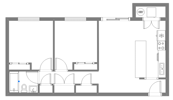 A floor plan of a house with a kitchen, living room, and bathroom.