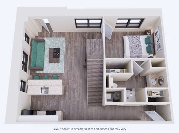 A layout of a room with furniture and a note that finishes and dimensions may vary.