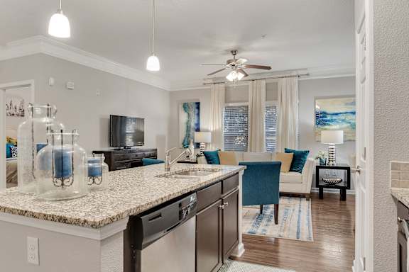 A kitchen with a counter and a fan. at Echo at Lake Norman, Mooresville, NC