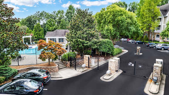A black car is parked on the street.
