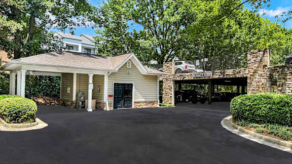 A house with a garage and a driveway.