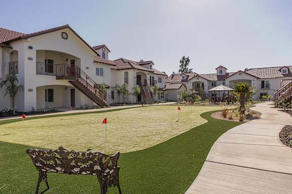 A Park Area with a Bench at The Villas at Ellis Manor, Fresno, California