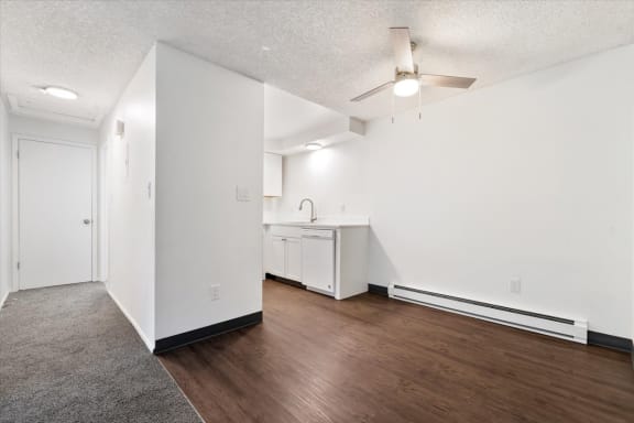 Dining area with faux wood flooring at Talavera Apartments in Idaho