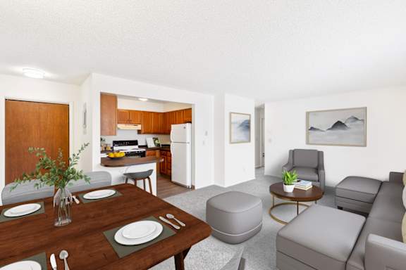 a living room with gray furniture and a window at Rock Creek, Billings