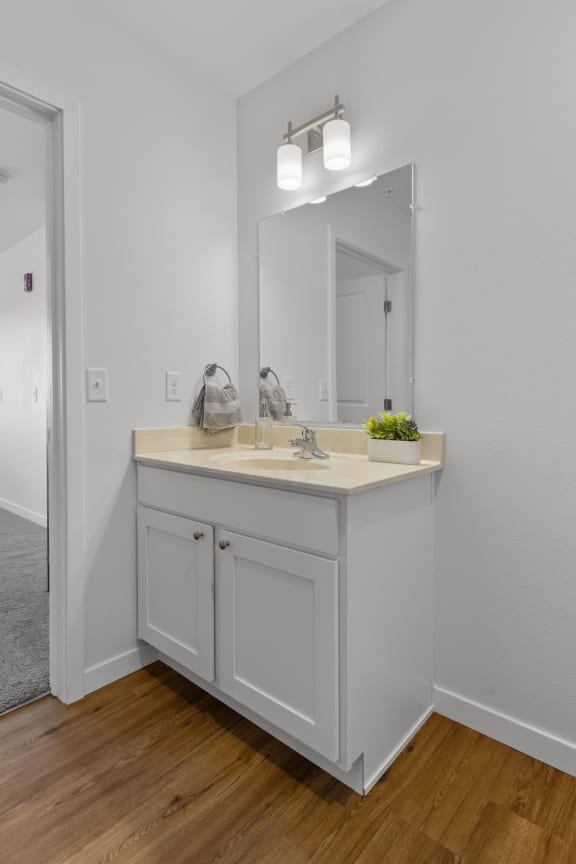a bathroom with a sink and a mirror at Yellowstone Landing, Montana