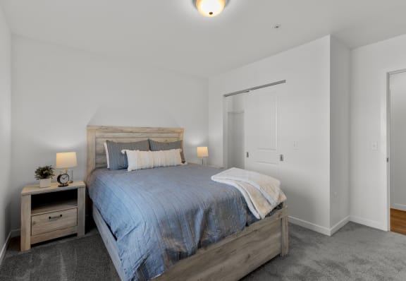 a bedroom with a large bed and a closet at Yellowstone Landing, Belgrade, MT, 59714