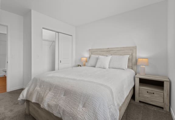 a bedroom with a bed and a closet at Yellowstone Landing, Montana, 59714