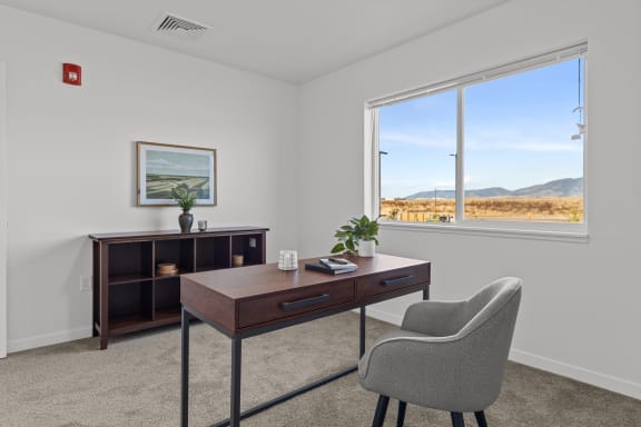 an office with a desk and a window and a chair at Yellowstone Landing, Belgrade, MT