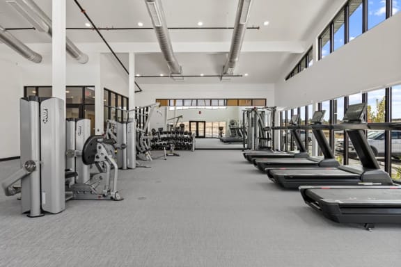 the gym has treadmills and other exercise equipment in it at Yellowstone Landing, Belgrade, MT