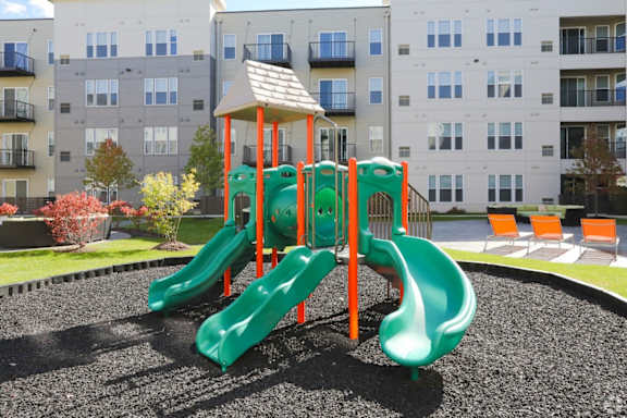 Playground with slides and climbing structure at Arden of Oak Brook Apartments, Oakbrook Terrace, Illinois